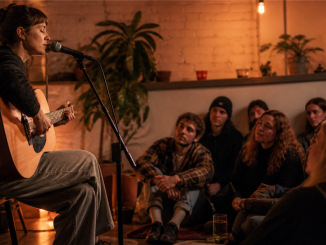 Independent singer-songwriter performing for an attentive small audience