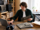 Independent musician managing direct music orders from a home studio
